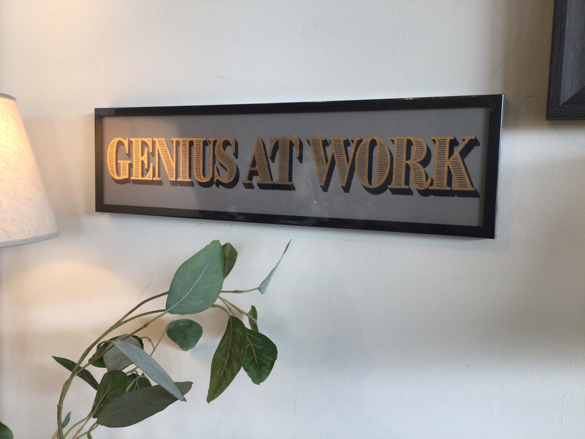 Genius at Work Sign
